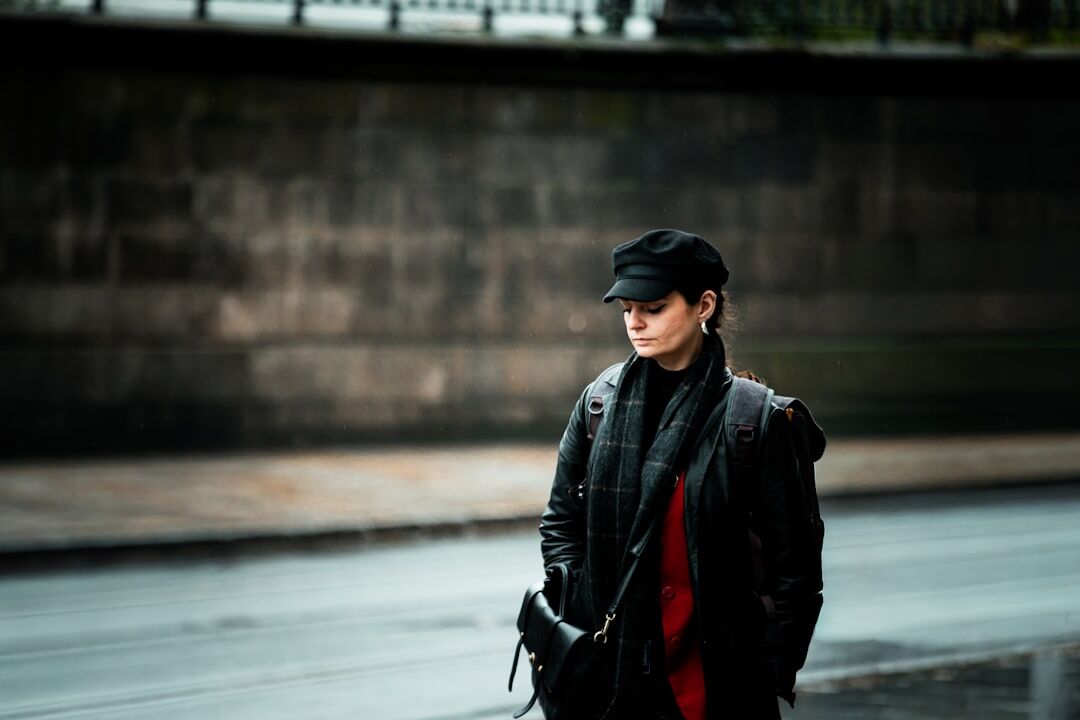detective walking in rainy city